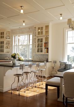 the kitchen is clean and ready to be used as a dining room or living room