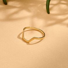 Discover the Half Hexagon Stacking Ring, a simple yet elegant addition to your jewelry collection. The distinctive half-hexagonal shape of this ring gives a sense of geometric appeal, creating a unique and timeless piece. - Made in 14k Solid Gold - Band Width: 1.40 mm / 0.05 inches - Thickness: 1.05 mm / 0.04 inches - This product comes with iconic Norm Jewels gift box Geometric Minimalist Formal Jewelry, Minimalist Hexagon Promise Ring, Minimalist Octagon Ring For Gift, Minimalist Octagon Promise Ring, Solid Gold Band, Stacking Ring, Gold Band, Signet Ring, Stacking Rings