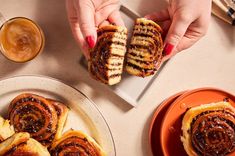 two plates with pastries and drinks on the table