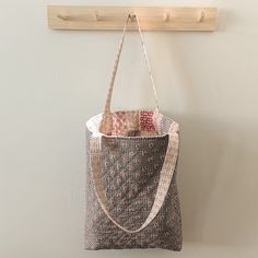 'Tis the season for curling up with a cup of warm tea and a favorite book! And Amy @ritualquiltcompany used the Mansfield Park fabrics to capture the cozy vibes and make the Reversible Riley Tote!⁠
⁠
This simple tote pattern features an updated rectangular gingham pattern on one side and a single fabric on the reversible side. Visit our blog for a link to the pattern and all of the fabric details from this timeless collection!