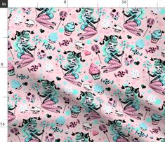 pink and blue fabric with cartoon characters on it