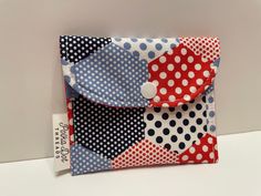 Keep your mini items in our super cute Snap Bags!  Perfect as a gift card holder! Use them as a coin pouch, pill bag, lipstick pouch, etc. Our Mini snap pouches are the perfect size to keep in your purse, backpack, makeup drawer, or where else suits you! Our Mini bags make the perfect add on birthday gifts for someone special, bridal party gifts, or just for yourself! :) This listing is for our Red, White & Blue Polka Dot Mini Snap Bag. This print features different red, white and blue polka patterns in hexagon shapes!  Each pouch has a sturdy color coordinating snap to keep all your goodies safe inside. The inside liner is a red with white dots cotton fabric liner. There is a soft interfacing on the back of the main fabric. :) Care & Cleaning:  Spot cleaning and hand washing is recommende Cute Red Coin Purse For Gift, Red Coin Purse With Removable Pouch For Gift, Red Coin Purse With Removable Pouch As Gift, Compact Red Coin Purse For Gift, Pill Bag, Snap Bags, Lipstick Pouch, Snap Bag, Makeup Drawer