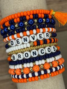 **IMPORTANT! DUE TO AN OUTAGE OF ORANGE BEADS, WE ARE HAVE DISABLED OUR OPTIONS WITH ORANGE BEADS. We have another option for orange beads, but they are not the same look as shown in these pictures. We can fill an order with those orange beads upon request! When orange beads come back available, we will update this post! The ultimate bracelet listing for any Denver Broncos Football fan! Go Broncos! These bracelets are SOLD INDIVIDUALLY unless purchased as a STACK! If wanting multiple bracelets, Broncos Bracelet, Football Bracelet, Go Broncos, Denver Broncos Football, Broncos Football, Multiple Bracelets, Spring Hill, Letter Beads, Denver Broncos