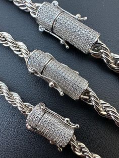 Gorgeous mens or ladies rope chains or bracelets
Hybrid stainless steel chain with a 925 silver clasp
 
Moissanite box clasp...VVS D Color moissanite stones that pass any diamond tester!!! 
Clasps are 1.5-2.5ct of moissanite stones!!!
Comes with GRA certificate
 
Great for pendants or wear alone!
100% Stainless Steel chain with a solid 925 silver clasp!!! Will never turn your neck green or change color
Stainless steel is even more durable than silver or gold
 
 
Made in Italy
Stamped "14k GP 925 "

 
4mm-6mm
 
Here are the weights for 24" chains (if you chain is shorter or longer weight will vary)
 
4mm- 26g...1.5ct moissanite (8.5" bracelet is 9 grams)
5mm- 40g...2.4ct moissanite (8.5" bracelet is 13 grams)
6mm- 57g...2.5ct moissani Silver Rope Chain Men, Luxury Men's Chain Bracelet With Sterling Silver Clasp, Nickel-free Stainless Steel Link Chain Bracelet, Luxury Sterling Silver Chain Bracelet, Tarnish Resistant, Mens Chain Bracelet Jewelry1000.com, 10k Gold Chain, Red Stone Ring, Colored Engagement Rings, Moissanite Earrings