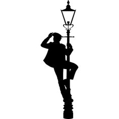 the silhouette of a man leaning on a lamp post