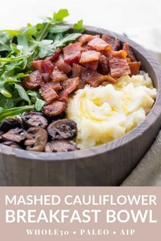 mashed cauliflower breakfast bowl with mushrooms, spinach and bacon on top