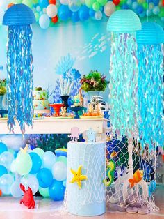 an under the sea birthday party with balloons and decorations