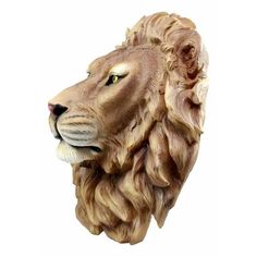 a statue of a lion's head on a white background