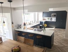 the kitchen is clean and ready to be used as a dining room or living room