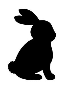 a black silhouette of a rabbit sitting on its hind legs, facing the viewer with one ear raised