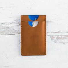 For the minimalist type, our handmade leather money clip features two card pockets and metal money clip. Made from durable buffalo calf, this leather has a smooth finish and will gradually darken and patina beautifully over time. - 2 card slots + Metal Money Clip - Measures approximately 2 3/4" wide x 4 1/2" tall Please note: Each piece is handmade and will vary slightly. Leather may have natural variations and finished markings which add to the character of each piece. Minimalist Brown Card Holder With Coin Pocket, Brown Minimalist Card Holder With Rfid Blocking, Leather Money Clip, Leather Money Clips, The Minimalist, Natural Tan, Handmade Leather, Money Clip, Leather Handmade