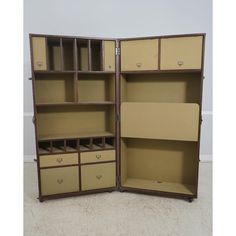 an open bookcase with drawers and shelves