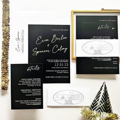 black and white wedding stationery with gold accents