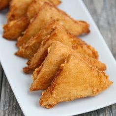 some fried food is on a white plate