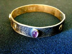 Beautiful Women's Greek Gemstone Bracelet. It is made out of Sterling Silver (aka Silver 925 each piece is stamped), 18k Gold ( aka Gold 750) and is decorated with 4 stunning Gemstones ( an Amethyst, a Pink Tourmaline, a Green Tourmaline and a lemon Citrine)... Hand Forged Round Bracelets As Gift, Hand Forged Bracelets As Gift, Gold Oval Bracelets, Unique Oval Gold Bracelets, Ancient Greek Bracelet, Quirky Bracelets, Greek Bracelet, Quirky Ring, Charm Bracelets For Girls