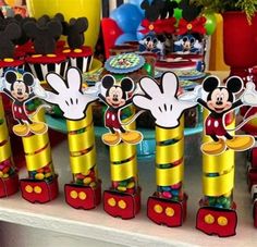 mickey mouse party decorations on a table