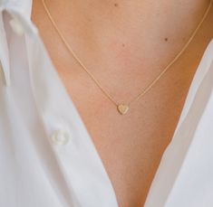 Classic and uber chic 14k gold heart on a dainty cable link chain necklace. Effortlessly chic, a timeless necklace that also makes the perfect gift! Made in L.A. Size of Heart: Approx. 6mm(W) by 6mm(H) Total Weight: Approx. 1 gram Ships in 5-7 business days Rush order ships in 2-4 business days Comes gift ready in a custom Zoe Lev jewelry box Minimalist Heart Charm Necklace With Cable Chain, Everyday Yellow Gold Heart Cut Charm Necklace, Minimalist Cable Chain Jewelry For Valentine's Day, Simple Yellow Gold Heart Pendant Jewelry, Minimalist Heart Pendant Charm Necklace With Cable Chain, Delicate Yellow Gold Heart Necklace For Everyday, Dainty Cable Chain Necklace For Valentine's Day, Everyday Yellow Gold Heart Necklace With Cable Chain, Elegant 14k Gold Heart Charm Necklace