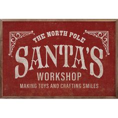 the north pole santa's workshop making toys and crafting smiles sign, circa 1950