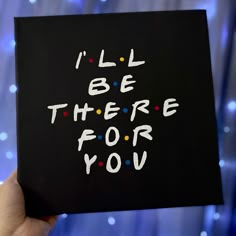 someone holding up a card with the words i'll be there for you on it