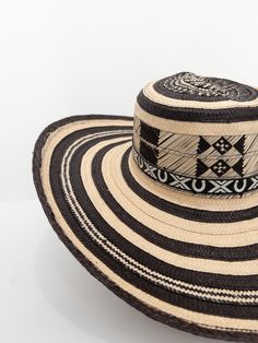 Introducing the Colombian Sombrero Volteado - a vibrant, handcrafted masterpiece! This traditional hat boasts intricate patterns and bold colors, meticulously woven by skilled artisans in Colombia. Elevate your style with this unique accessory, blending cultural richness and contemporary flair. Perfect for festivals, events, or as a statement piece. Embrace Colombian craftsmanship with every wear. Latin American Art, Latin American, Intricate Patterns, Miami Fl, Sun Hat, Accessories Unique, Straw Hat, American Art, Sun Hats