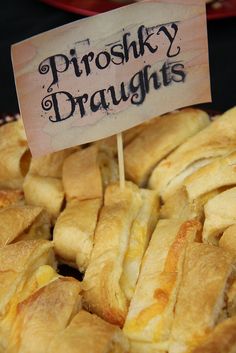 there is a sign that says proshy draughts on top of bread rolls