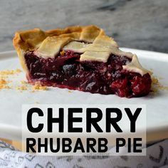 a slice of cherry rhubarb pie on a plate with the words cherry rhubarb pie