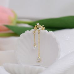 💎 Materials: 14k Gold Electroplated - more durable than regular platings Cubic Zirconia Pearlescent Beads 🏷 Quantity: 1 Ear Cuff, not sold by pair Elegant Cubic Zirconia Dangle Ear Cuff, Elegant Gold Plated Silver Ear Cuff, Elegant Tarnish Resistant Ear Cuff As A Gift, Elegant Gold Plated Ear Cuff Gift, Elegant Dangle Ear Cuff For Wedding, 14k Gold Ear Cuff For Wedding, Elegant Gold Plated Ear Cuff For Formal Occasions, Elegant Rose Gold Ear Cuff, Elegant Cubic Zirconia Ear Cuff For Gifts