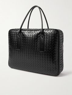 Ideal for busy days, Bottega Veneta's briefcase holds more than just your laptop and has a separate zipped compartment for other essentials. It's been crafted in Italy from supple black leather woven in the house's signature intrecciato technique. Zoom in and you'll notice the silver-tone metal knot charm hanging from one of the handles. Bottega Veneta Jodie, Leather Briefcase Men, New Bottega, Latest Bags, Bottega Veneta Intrecciato, Briefcase For Men, Leather Weaving, Leather Briefcase, Silver Accessories