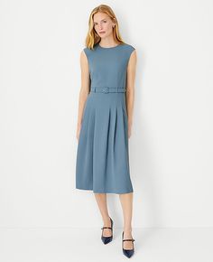 Elevate your wardrobe with the Ann Taylor Petite Pleated Belted Crew Neck Dress, a testament to refined elegance and modern style. This dress features a fluid crepe construction that gracefully flows below the knee, ensuring a sophisticated silhouette for any occasion.

- **Size:** Petite 0
- **Color:** Blue Echo
- **Material:** Shell: 95% Polyester, 5% Spandex; Lining: 100% Polyester
- **Fit:** Tailored fit
- **Length:** 28" from natural waist
- **Features:** Crew neck, cap sleeves, self-tie bu Ann Taylor Loft Outfits, Extra Dresses, Tweed Shift Dress, Crew Neck Dress, Crewneck Dress, Pleated Midi Dress, Feminine Dress, Ann Taylor Dresses, Buckle Belt