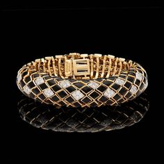 For Sale on 1stDibs - A rare David Webb flexible black enamel bracelet accented with 96 round brilliant cut diamonds totaling 2.40 carats. This gorgeous piece measures approximately Diamond Gold Bracelet, David Webb, Enamel Bangle, Bracelet Online, Enamel Bracelet, Diamond Gold, Women Diamond, Vintage Jewels, Gold Enamel