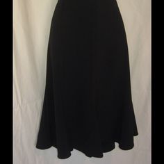 This Solid Black Skirt With Side Zip Is The Perfect Wardrobe Staple. Versatile Enough For The Office Or Date Night, It’s Definitely A Closet Foundation Piece. It Is In Perfect Condition, And New With Tag. Please Refer To Photos For Measurements Smoke Free, Pet Free Home All Reasonable Offers Considered Bin A Fitted Black Maxi Skirt For Work, Classic A-line Maxi Skirt For Formal Occasions, Elegant Black A-line Skirt, Black Stretch A-line Bottoms, Black Full-length Flowy Skirt, Full-length Pleated Black Skirt, Classic Black A-line Skirt, Black Full Length Lined Skirt, Formal Fitted Maxi Skirt