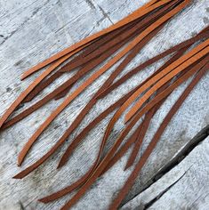 -These boho tassel earrings are made from soft rust-color deerskin leather.  Part Cowgirl, part Rock & Roll, the tassel earrings give a big kick to any outfit.-Dramatic but lightweight enough to wear every day. -9" total length.-Earwires are antique-brass.  Goldfill earwires are available by request. -Deerskin leather is sustainably sourced in the USA.-Ok to get wet.-Available in 14 colors.-Designed and handmade in South Pasadena, CA.Check out more of our lovely earrings here:https://www.ets Brown Tassel Earrings For Festivals, Brown Fringed Tassel Earrings Gift, Brown Fringe Tassel Earrings As Gift, Brown Fringe Tassel Earrings For Gift, Brown Fringe Tassel Earrings For Festivals, Coachella Earrings, Exotic Necklace, Rock Amp, Black Statement Earrings