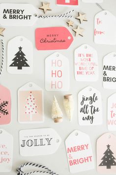 christmas gift tags are laid out on a white surface with black and pink lettering that says merry & bright