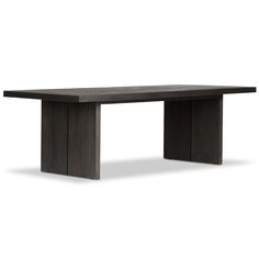 a black table sitting on top of a white floor