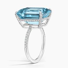 Festivity Sky Blue Topaz and Diamond Cocktail Ring in Platinum Formal Light Blue Diamond Ring, Luxury Aquamarine Diamond Ring With Prong Setting, Luxury Blue Topaz Cushion Cut Ring, Luxury Light Blue Ring With Brilliant Cut, Luxury Light Blue Brilliant Cut Ring, Luxury Blue Topaz Ring With Diamond Accents, Luxury Blue Topaz Halo Ring, Luxury Light Blue Topaz Ring With Center Stone, Luxury Asscher Cut Topaz Ring With Diamonds