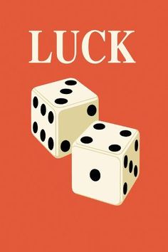 two dices sitting on top of each other with the words luck written above them