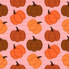 an orange and brown pumpkin pattern on a pink background