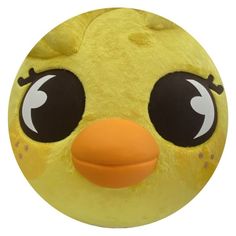 a close up of a stuffed animal toy with big eyes and an orange beak on it's head