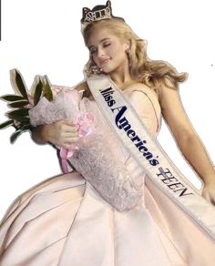 a woman in a pink dress holding a bouquet and wearing a tiara with the words miss america written on it