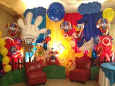 mickey mouse balloon decorations and balloons at a birthday party