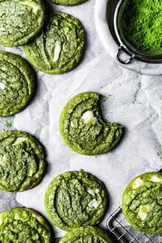 green cookies with white crumbs on top