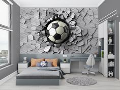 a bedroom with a soccer ball breaking through the wall