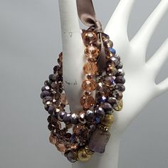 Ali Khan Glass Beaded Natural Stone 5pc Bracelet Set With Gift Box Elegant Purple Stretch Bracelet For Party, Brown Crystal Bracelet With Faceted Beads As Gift, Luxury Brown Jewelry With Colorful Beads, Brown Crystal Bracelet With Faceted Beads For Gift, Elegant Purple Stretch Bracelet With Faceted Beads, Brown Faceted Beads Crystal Bracelet Gift, Brown Crystal Faceted Beads Bracelet, Luxury Elegant Multi-stone Beaded Bracelets, Luxury Multi-stone Orange Jewelry