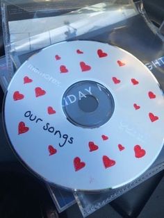 a cd that has hearts on it with the words today our sons written on it