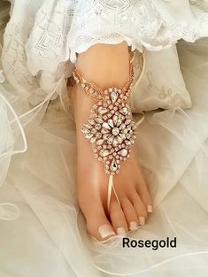 "--Vintage Foot Jewelry, Lavender Wedding Barefoot Sandals, Bridal Foot Jewelry, Silver Rhinestone Foot Jewelry, Footless Sandal- FT005 -- This stunning silver rhinestone footless sandal is the perfect accessory for a beach or garden wedding. This sandal is made clear rhinestone applique and silver satin ribbon. It is very comfortable and adjustable. Model in photo above is a US Size 7.5 . **This listing is for 1 PAIR (2 pcs) of barefoot sandals **Measurement** Applique Size: Approx 3.5\"L + 2.5 Adjustable Gold Barefoot Sandals For Wedding, Wedding Barefoot Sandals With Rhinestones, Adjustable Rhinestone Barefoot Sandals For Wedding, Glamorous Wedding Sandals With Adjustable Fit, Glamorous Adjustable Wedding Sandals, Summer Wedding Jewelry With Rhinestones, Vintage Wedding Sandals For Summer, Foot Jewelry Beach Wedding, Sandals Bridal