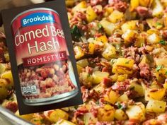 a can of corned beef hashbrowns on top of a casserole dish