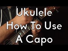 a man playing ukulele with the words how to use a capo on it