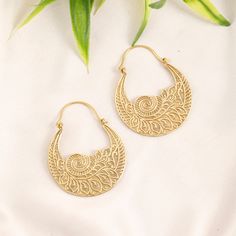 Elegant Ethnic Style Brass Hoop Earrings. Finely Decorated With Engraved Tribal Patterns. Wear it everyday or whatever the occasion. Indispensable for Boosting an Allure, they Catch the Eye, Reflect the Light and Highlight the Face. Material: Brass Color: Silvered or Golden Length: 5cm Width: 4cm Thickness: 0.2cm Weight: 14 GM per Pair Handmade Delivered in a Fabric Pouch Ideal for Gifting To offer or simply treat yourself, do not hesitate! *◅ ↠ ☽ ◅* + *▻ ☾  You May Pair Them with These Other Je Gold Spiral Bohemian Earrings, Bohemian Gold Spiral Earrings, Bohemian Teardrop Brass Hoop Earrings, Bohemian Metal Hoop Earrings For The Beach, Bohemian Adjustable Spiral Hoop Earrings, Bohemian Spiral Hoop Earrings For Pierced Ears, Bohemian Spiral Hoop Earrings As Gift, Bohemian Spiral Nickel-free Hoop Earrings, Bohemian Spiral Hoop Earrings In Metal