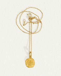 Capturing the spirit of strength and protection, this solid gold necklace showcases the legendary centaur on the front, with a lion rampant on the reverse. Hanging from a 14k curb chain, this coin pendant is made from pure 24k gold offering a rich, tactile lustre that is eternally timeless.  
 Each piece is crafted by hand, ensuring that every necklace is unique. Gold Medallion Coin Necklace With Cable Chain, 14k Gold Amulet Coin Necklace Tarnish Resistant, Yellow Gold Coin Charm Necklace With Adjustable Chain, Yellow Gold Plated Charm Necklaces With Coin Pendant, Yellow Gold Plated Charm Necklace With Coin Pendant, Recycled Gold Medallion Necklace With Coin Pendant, Yellow Gold Medallion Coin Necklace With Adjustable Chain, Yellow Gold Medallion Necklace With Adjustable Chain, Yellow Gold Amulet Coin Necklace