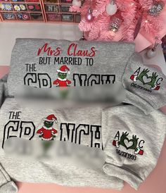 This Mrs Claus but married to design features the popular green guy. Design makes it the perfect matching Christmas Sweater and perfect matching gift for couples. This design is is embroidered on the full front chest and also has embroidered sleeves that are customized. PLEASE NOTE LISTING IS FOR 1 SWEATSHIRT OF HOODIE SO PLEASE PICK YOUR SELECTIONS FROM THE DROP DOWN.  SIZING This sweater is a unisex, loos fit style. Our customers are most satisfied with the size they normally wear in a regular Matching Gifts For Couples, Couple Christmas Sweaters, Xmas Embroidery, Couples Christmas Sweaters, Matching Christmas Sweaters, Gifts For Couples, Matching Sweaters, Embroidered Sleeves, Anniversary Dates